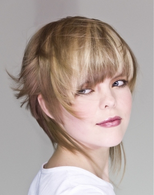 A medium blonde straight coloured hairstyle by Lee Stafford