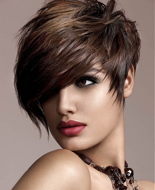 A short brown straight coloured flicked bob hairstyle by Royston Blythe