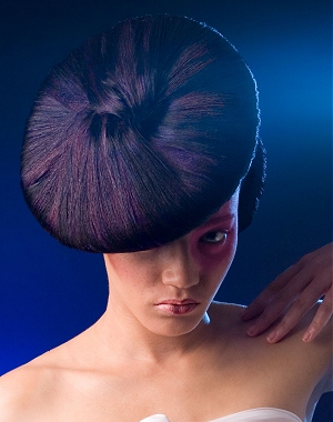 A long black straight sculptured quirky avant garde hairstyle by asquared