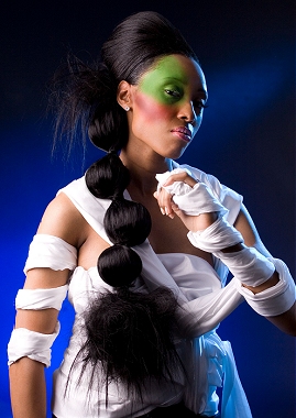 A long black straight sculptured quirky avant garde balls hairstyle by asquared