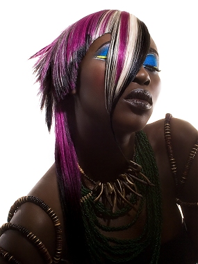 A long brown straight coloured sculptured quirky avant garde Mul hairstyle by asquared