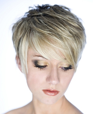 A short blonde straight choppy coloured hairstyle by Artisan