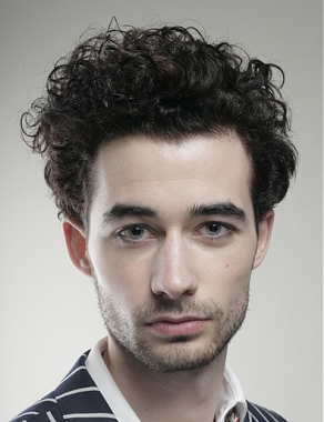 A medium brown curly Bridal hairstyle by The Gallery