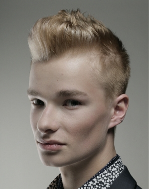 A short blonde straight coloured quiff spikey hairstyle by Peter Gottard Hairdressing