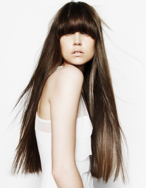 A long brown straight coloured hairstyle by Cream