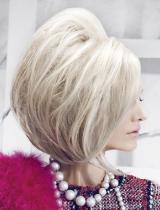 Medium Blonde Layered Hairstyle by Intercoiffure