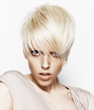 A short blonde straight coloured bob hairstyle by Cream