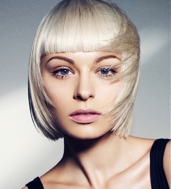 A medium blonde straight coloured bob hairstyle by Estetica