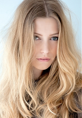 A long blonde straight coloured hairstyle by Estetica