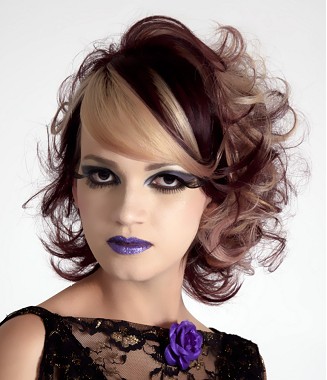 A medium black straight wavy coloured multio-tonal Rock-Chick hairstyle by Andrade Oliveira