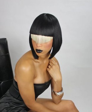 A medium black straight bob coloured multi-tonal fringe ethnic relaxed hairstyle by Angie Jackson & Company 