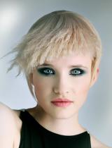 Short Blonde Frizzy Hairstyle by Byron Hairdressing