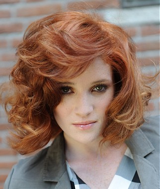 A medium red wavy copper big-bouncy volume hold healthy curl hairstyle by IT&LY Hair Fashion