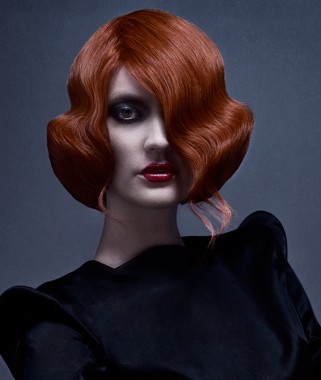 A medium red wavy coloured Iconic hairstyle by Haringtons