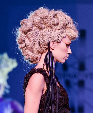 A long blonde straight frizzy sculptured avant-garde coloured woolly hat hairstyle by David Murry