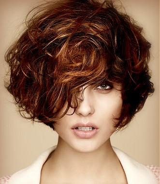 A medium brown wavy coloured multi-tonal messy bob hairstyle by Kenchez