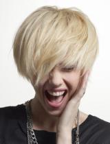 Short Blonde Choppy Hairstyle by Tchip Coiffure