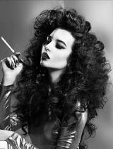 Black Curly Hairstyle by KJM Salons