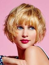 Blonde Volumous Hairstyle by Tchip Coiffure