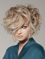 Blonde Curly Hairstyle by Tchip Coiffure