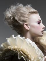 Long Blonde Frizzy Hairstyle by Webster Whiteman